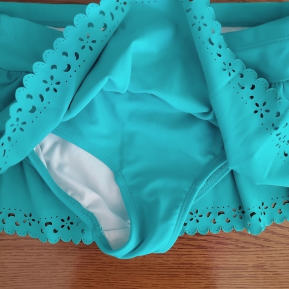 Two pc. Hanna Andersson flouncing top and swim skirt. Girl 130      (US 8). - Picture 4 of 6